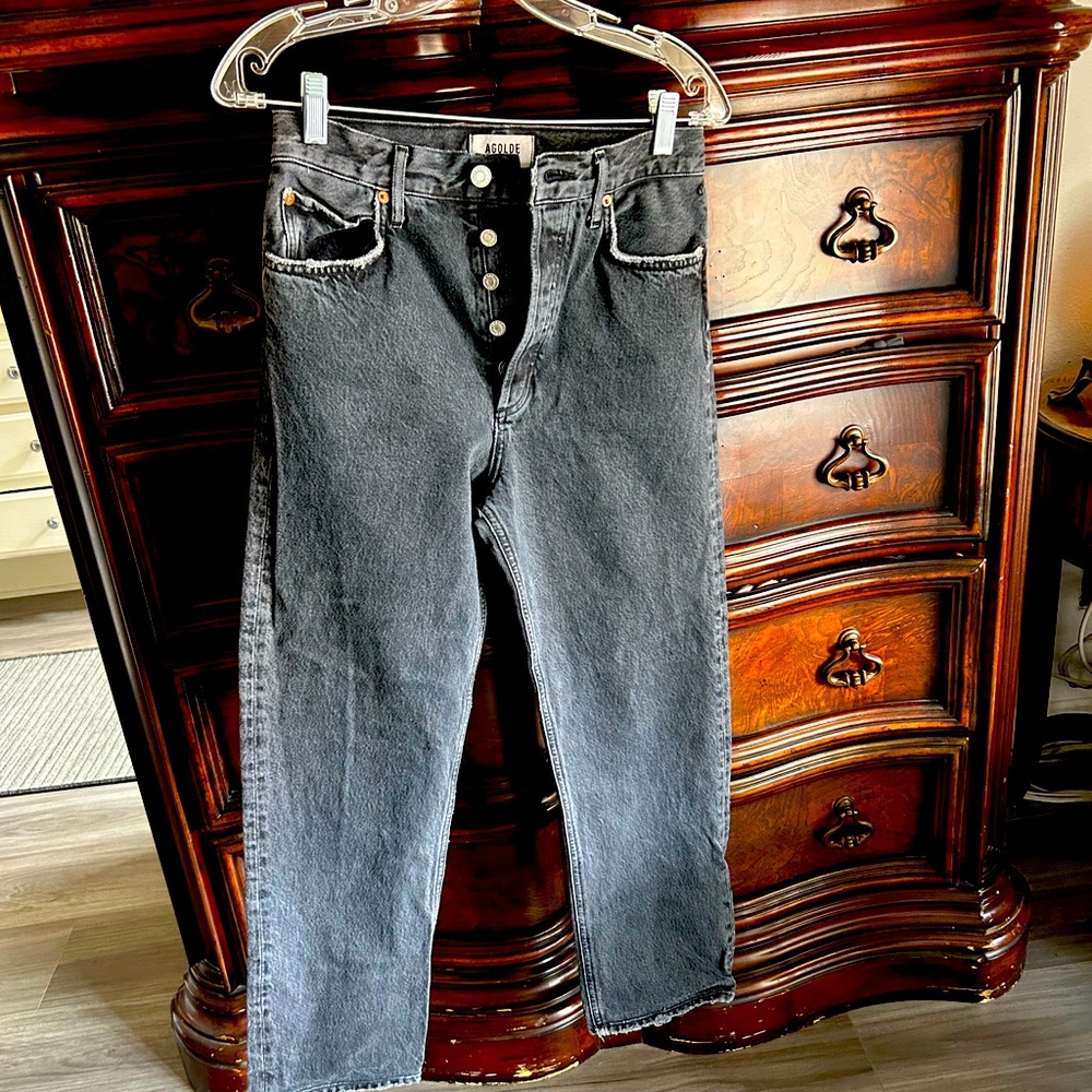 Black distressed Agolde button fly jeans